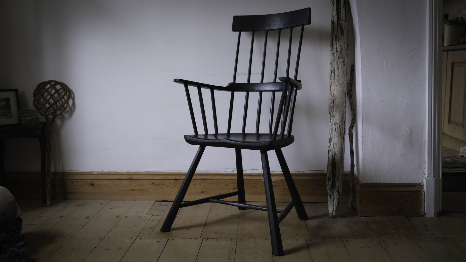 Little black Welsh stick chair by Dave Cockcroft